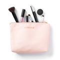 Collagen for her cosmetic bag with make-up brushes